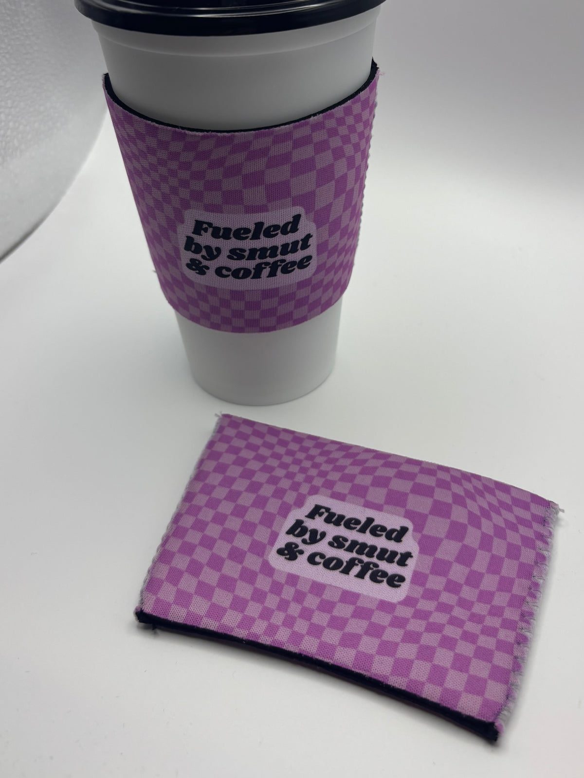 Fueled by Smut & Coffee Cup Cozy – Purple Checkerboard