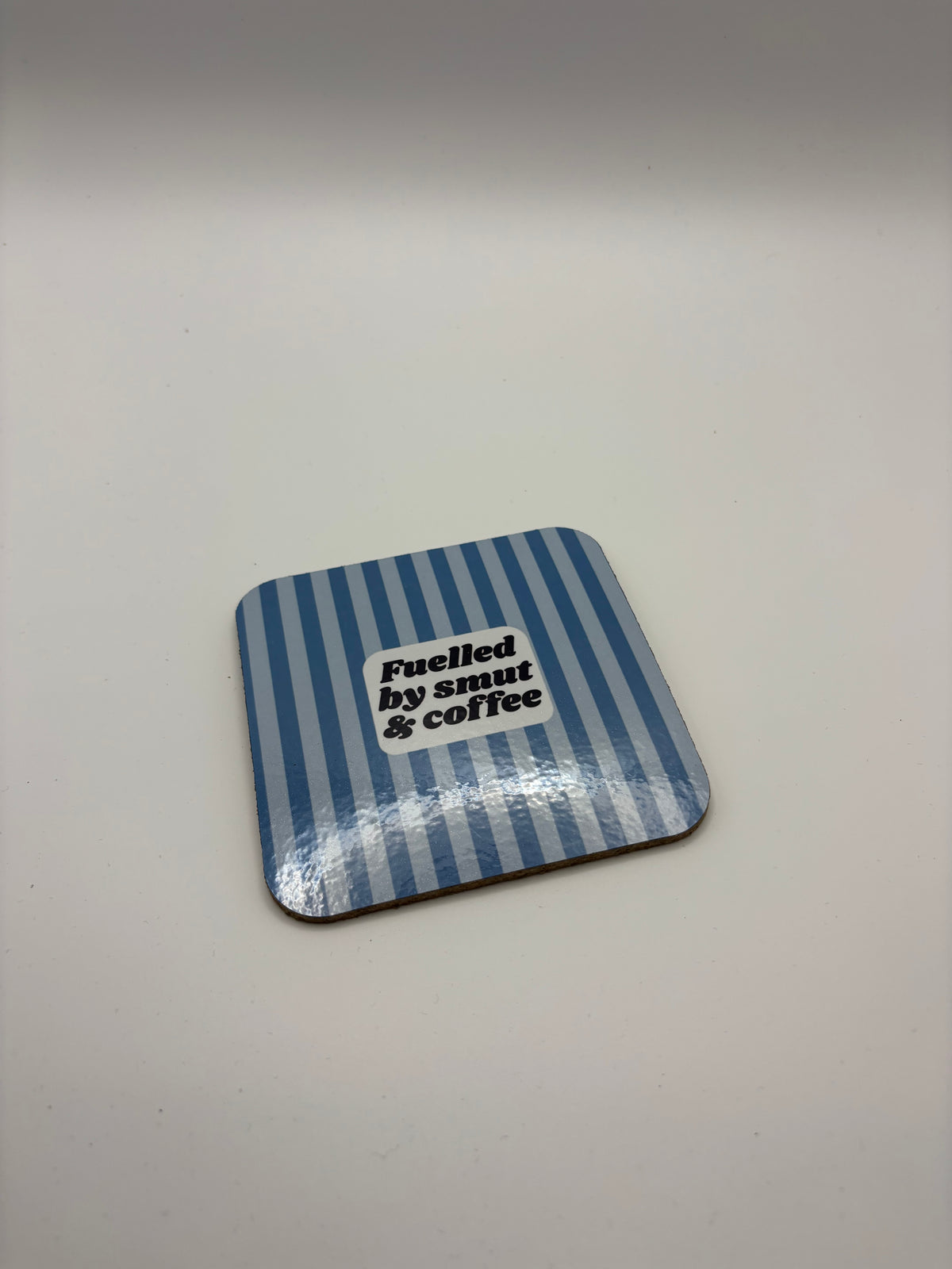 Fuelled by Smut & Coffee Cork Coaster – Blue Stripes